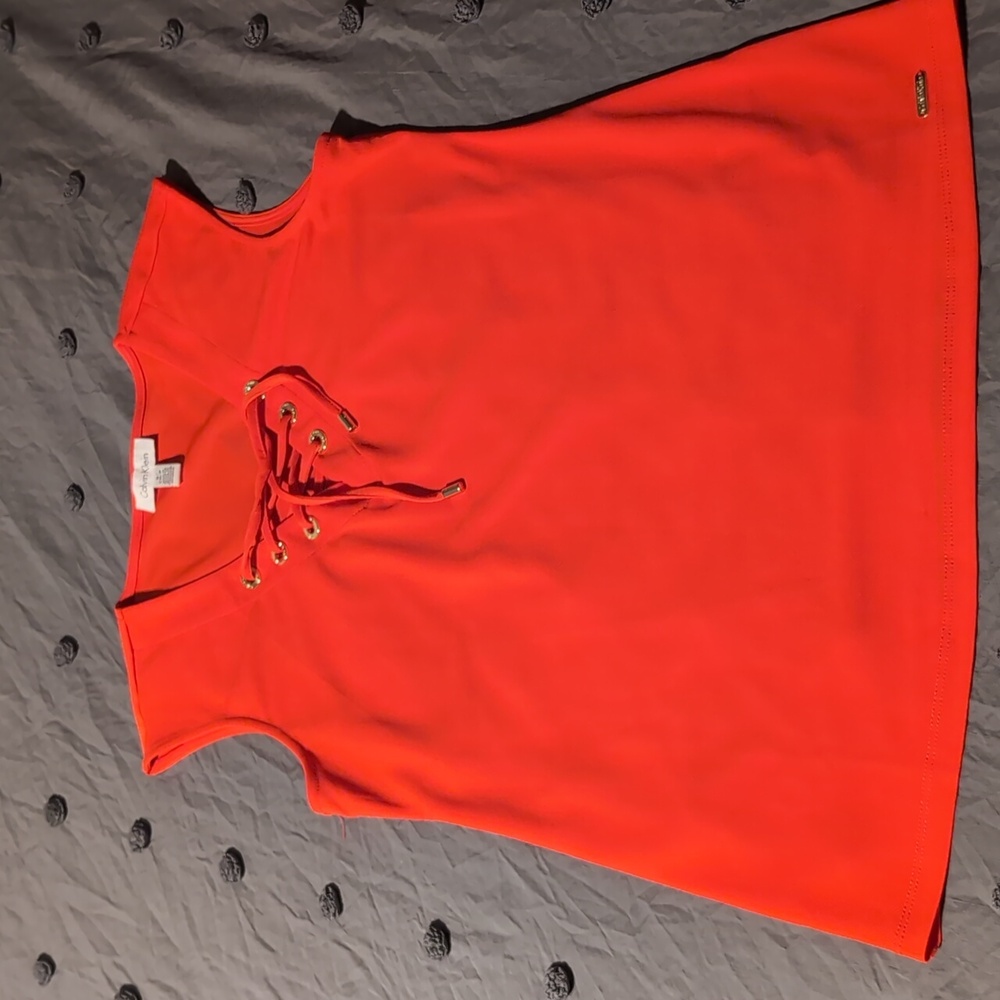 Calvin Klein orange sleeveless shirt